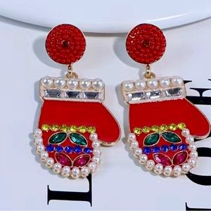 Red Christmas mittens. Beaded and jewelled.